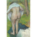 ung kvinde, der klæder sig på - Edgar Degas — visning af kunstværket