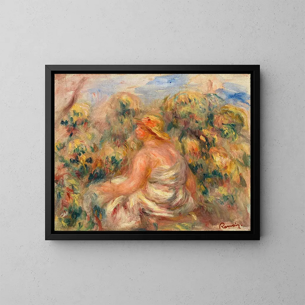 Kvinde med hat i et landskab - Pierre-Auguste Renoir — indrammet kunstværk på væggen