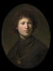 En ung mand med en kæde - Rembrandt van Rijn — visning af kunstværket