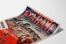Vintage plakat Bretagne – Paramé, Saint-Malo-bugten, vist på et buet ark set i perspektiv.