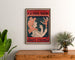 Vintage reklameplakat "À la France moderne, Lyon" indrammet over et trækommode mellem planter.