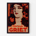 Vintage reklameplakat Perfumes Griet, vist i en tynd ramme på en lys væg.