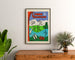 Vintage turistplakat – L’Ain touristique, indrammet over en kommode af træ mellem planter.