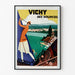 Vintage turistplakat – Vichy, kilder og turisme, vist i en tynd ramme på en lys væg.