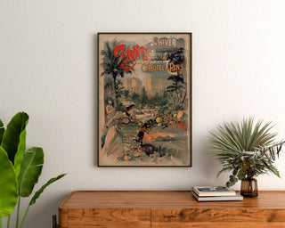 Vintageplakat Cannes, Grand Hôtel des Pins, indrammet over en trækommode mellem planter.