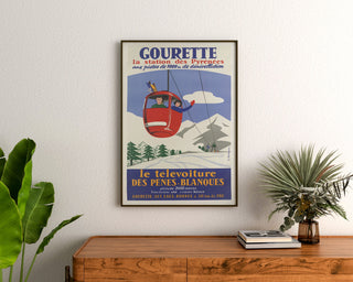 Vintage-plakat Gourette, télévoiture, indrammet over en trækommode mellem planter.