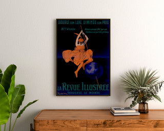 Vintage plakat La Revue illustrée, indrammet over en trækonsol mellem planter.