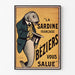 Vintage plakat La Sardine française, Béziers, vist i en tynd ramme på en lys væg.