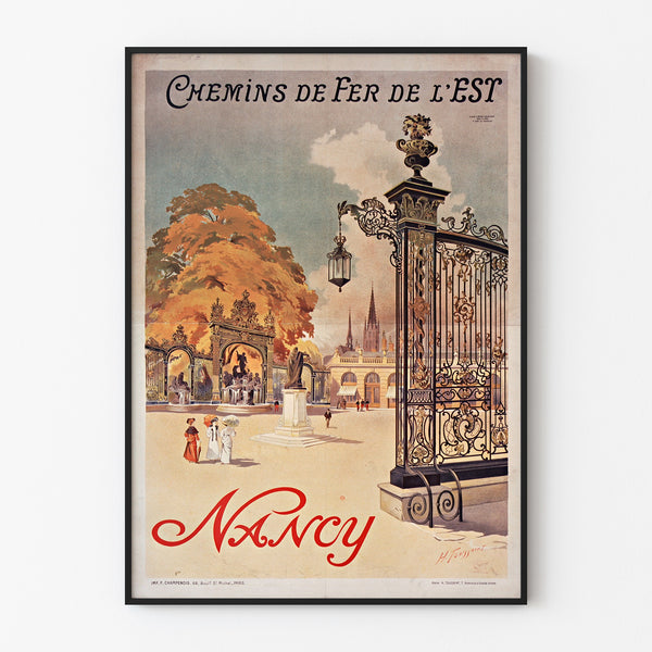 Vintage-plakat Nancy, chemins de fer de l’Est, indrammet i en tynd ramme på en lys væg.