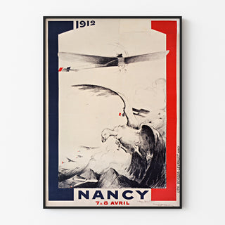 Vintage-plakat Nancy, flyveopvisning, indrammet i en tynd ramme på en lys væg.