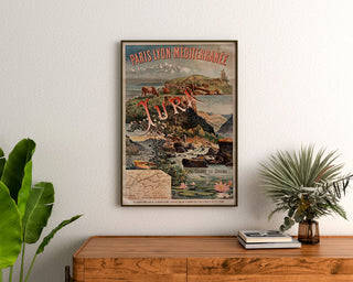 Vintageplakat Paris Lyon Méditerranée, Jura, indrammet over en kommode i træ mellem planter.