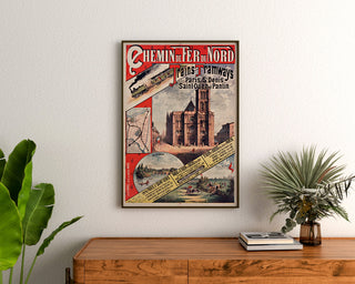 Vintage plakat Paris, Saint-Denis, tog og sporvogne, indrammet over en kommode i træ, flankeret af planter.