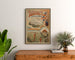 Vintage plakat Touraine, Frankrigs have, indrammet over en trækommode mellem planter.