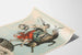 Vintage plakat af Bock Beer med danserinde og ged