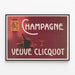 Vintage plakat Champagne Veuve Clicquot — indrammet kunstværk på væggen