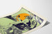 Vintage plakat af Queen City Printing Ink Company i orange, blå og grøn nuancer