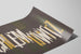 Plakat Typografisk design Schlemowitz i hvid og guld — visning af kunstværket