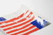 Grafisk plakat med stiliseret amerikansk flag af Peter Paul Piech